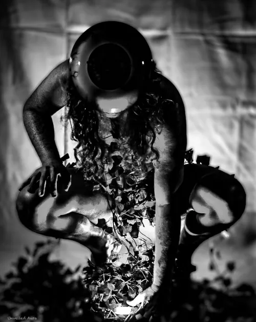 A cosmic gardener tending to forgotten roots. Thumbnail