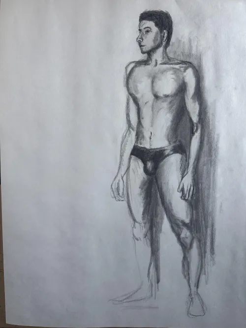 A young man stands proudly in his undies Thumbnail