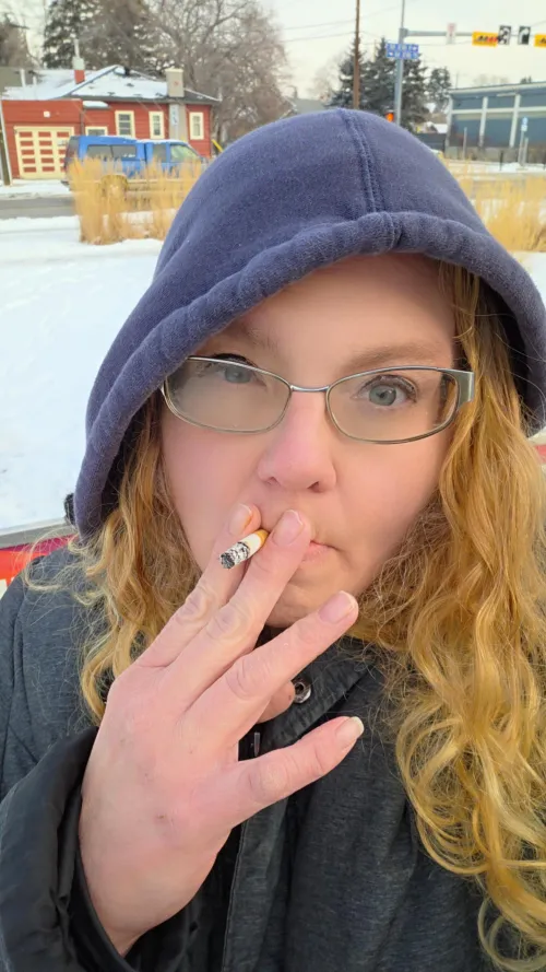 Cold out and bundled up but still smoking hot Thumbnail
