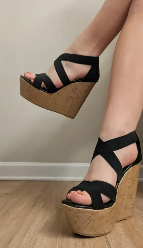 Cork wedges and bare legs Thumbnail
