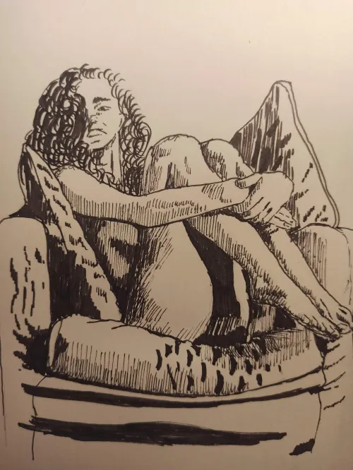 Curled up in a chair Thumbnail