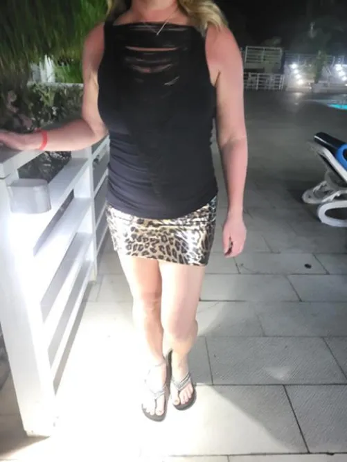 Sexy leopard leather mini skirt, see through top for dinner and the show Thumbnail